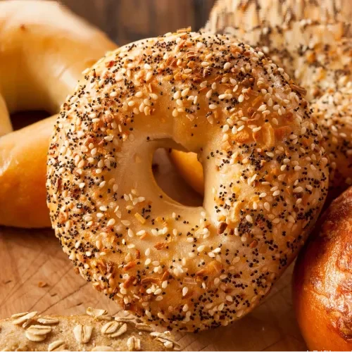 Assorted bagels with sesame and poppy seeds.