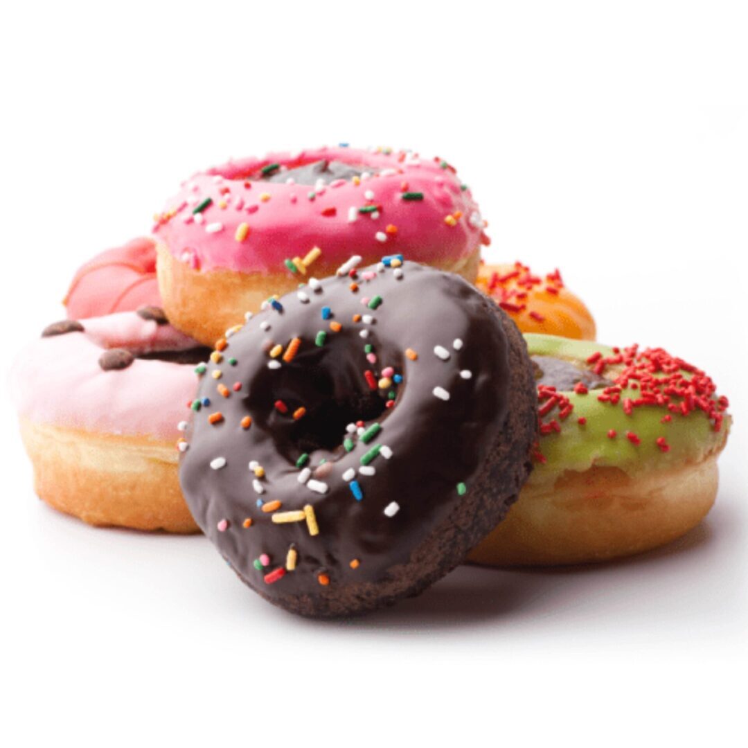 Colorful assortment of frosted donuts with sprinkles.
