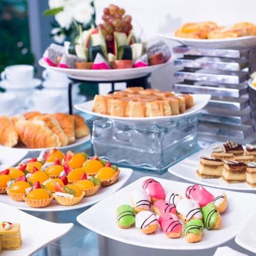 A vibrant spread of assorted desserts and pastries on a table.